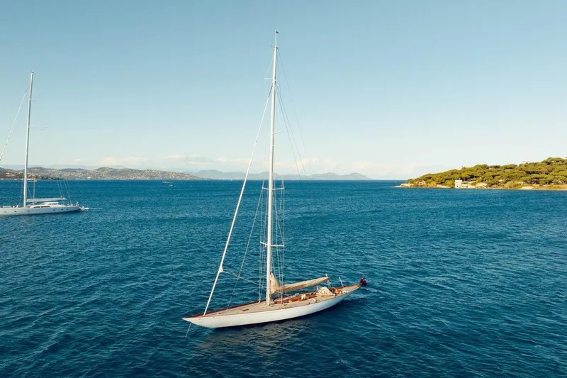 Savannah Yacht Photos Pics Sailing yacht "Concordia Custom Pedrick Design Sloop" on serene blue waters, 1996 model.