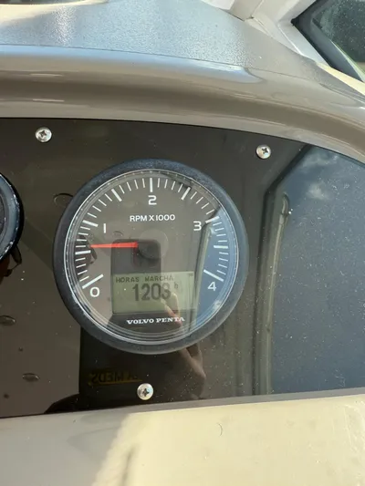  Yacht Photos Pics Volvo Penta RPM gauge on 2009 Cruisers Yachts 390 Sports Coupe, showing 1203 hours.