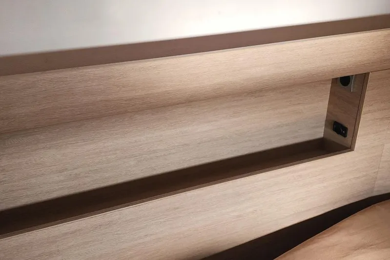  Yacht Photos Pics Wooden interior detail of a 2016 Bali 4.5 model, featuring a built-in shelf.