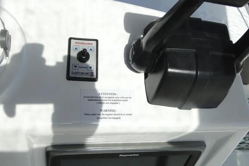 Yacht Photos Pics Control panel of a 2016 Bali 4.5 yacht with windlass and warning label.