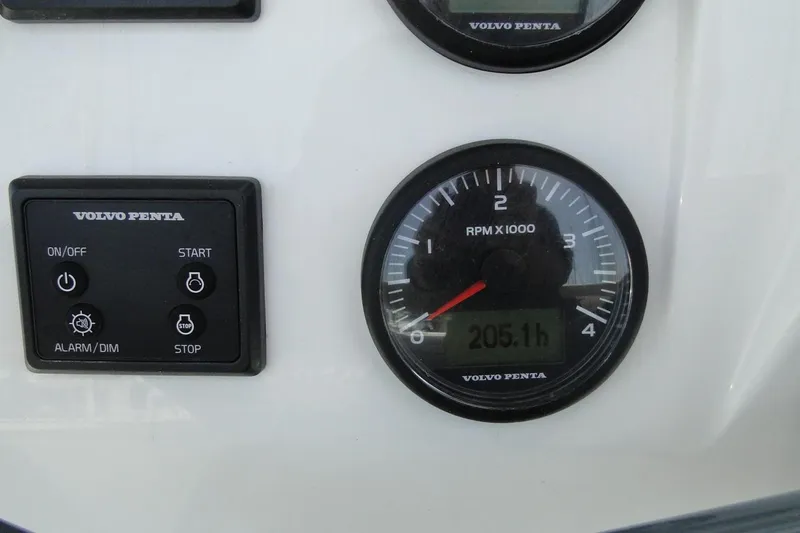  Yacht Photos Pics Volvo Penta control panel and tachometer on 2016 Bali 4.5 boat, showing 205.1 hours.