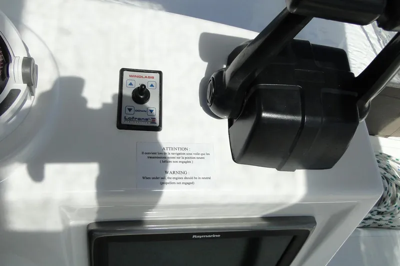  Yacht Photos Pics Control panel of a 2016 Bali 4.5 yacht with windlass and warning label.