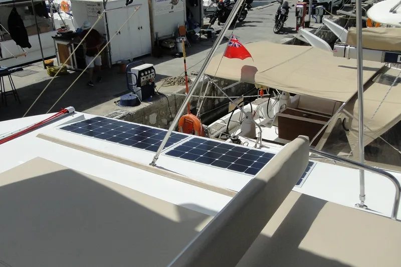  Yacht Photos Pics Bali 4.5 catamaran (2016) with solar panels docked at marina.
