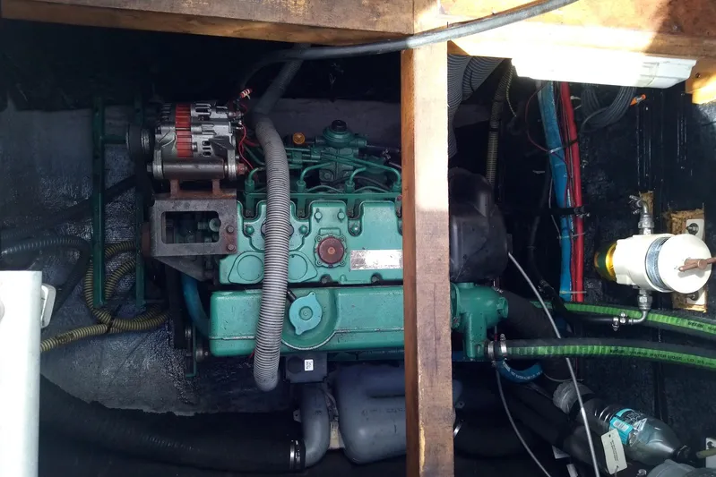  Yacht Photos Pics Engine compartment of a 2016 Bali 4.5, showcasing mechanical components and wiring.