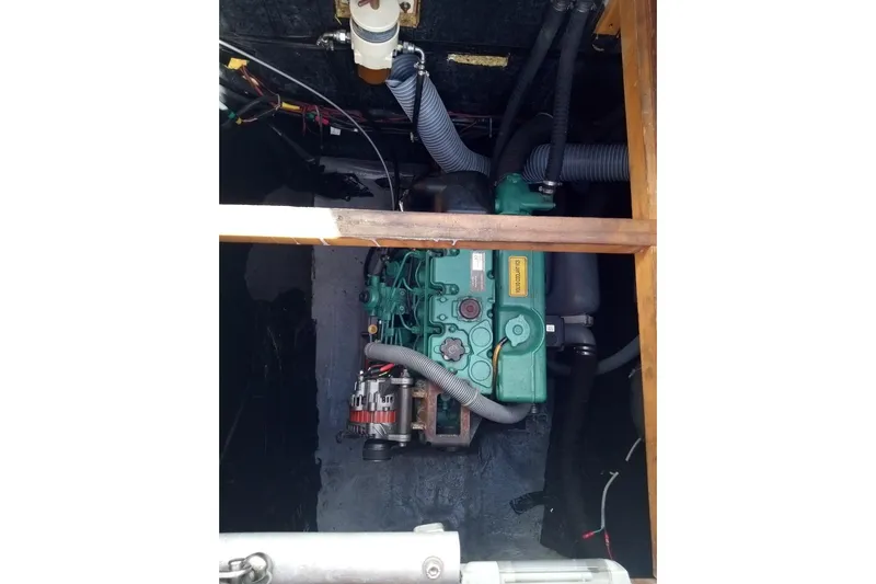  Yacht Photos Pics Engine compartment of a 2016 Bali 4.5 model, showcasing mechanical components and wiring.
