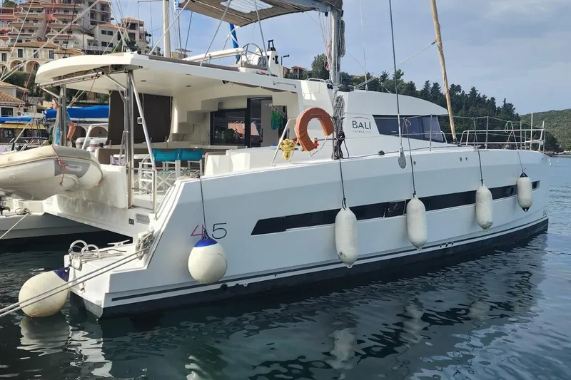  Yacht Photos Pics 2016 Bali 4.5 catamaran docked in a scenic marina setting.