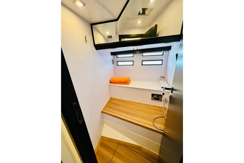 Gustavia I Yacht Photos Pics Interior of 2021 OKEAN 55 yacht, featuring modern wooden steps and sleek design.