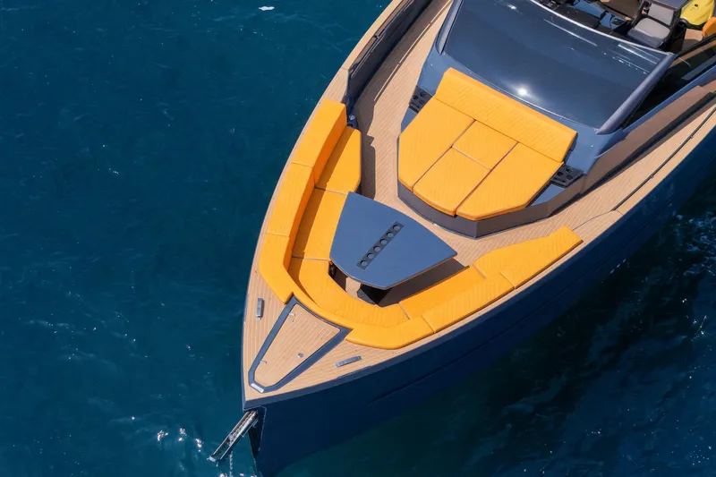 Gustavia I Yacht Photos Pics Aerial view of 2021 OKEAN 55 yacht with vibrant orange deck cushions.