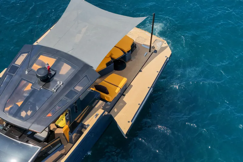 Gustavia I Yacht Photos Pics Luxury OKEAN 55 yacht, 2021 model, with sleek design and sunshade on blue ocean.