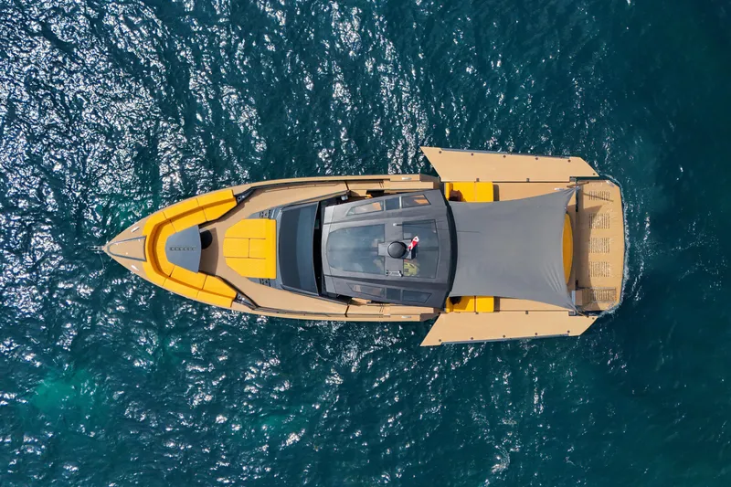 Gustavia I Yacht Photos Pics Aerial view of 2021 OKEAN 55 yacht on blue ocean water.