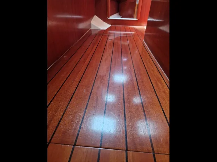  Yacht Photos Pics Polished wooden floor inside a 2001 Beneteau Oceanis 473 Clipper yacht.
