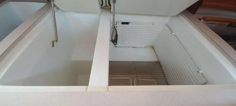 Happy Destiny Yacht Photos Pics Interior view of Jeanneau Sun Odyssey 43 DS 2004 yacht's storage compartments.