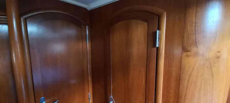 Happy Destiny Yacht Photos Pics Wooden interior doors on a 2004 Jeanneau Sun Odyssey 43 DS yacht.