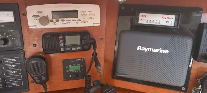 Happy Destiny Yacht Photos Pics Control panel of a 2004 Jeanneau Sun Odyssey 43 DS with Raymarine navigation equipment.