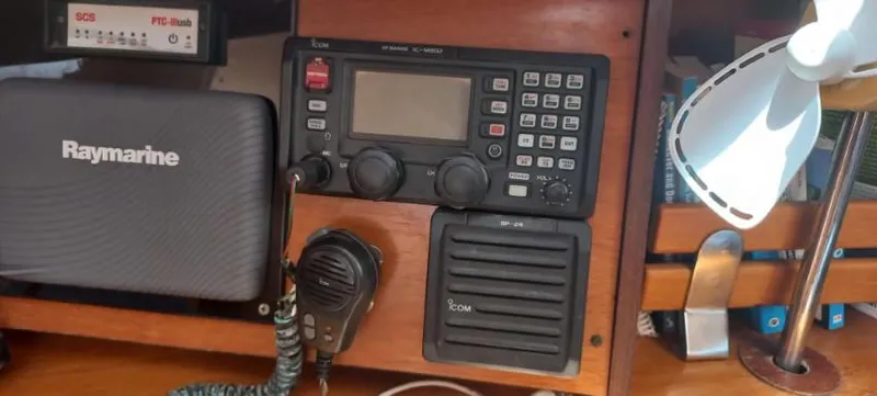 Happy Destiny Yacht Photos Pics Navigation equipment on a 2004 Jeanneau Sun Odyssey 43 DS sailboat, featuring Raymarine and Icom devices.