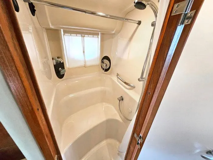  Yacht Photos Pics Shower area in 2006 Sea Ray 44 Sundancer yacht, featuring sleek design and modern fixtures.