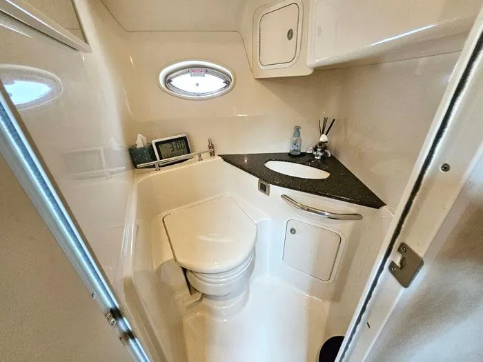  Yacht Photos Pics Luxurious bathroom in 2006 Sea Ray 44 Sundancer yacht with modern amenities.