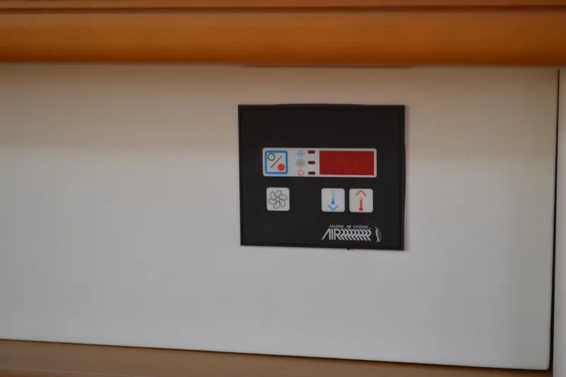 Down Time Yacht Photos Pics Control panel on 2008 Jeanneau Sun Odyssey 45 DS yacht interior.