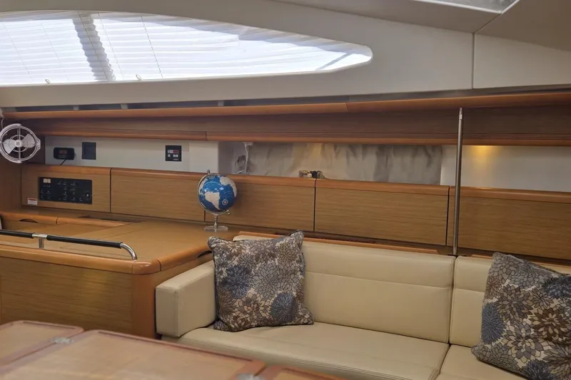 Down Time Yacht Photos Pics Interior of 2008 Jeanneau Sun Odyssey 45 DS yacht with elegant seating and decor.