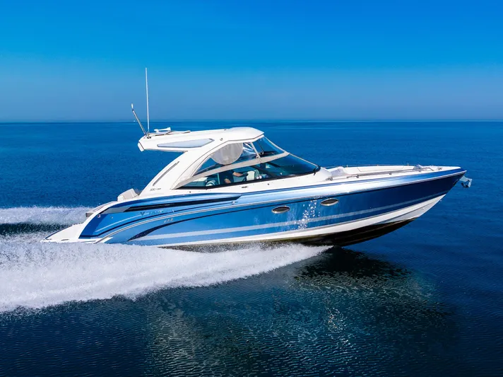 Good Morning Sunshine Yacht Photos Pics 2019 Formula 330 Crossover Bowrider cruising on open water, showcasing sleek design and performance.