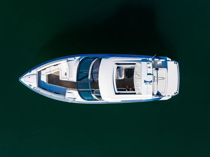 Good Morning Sunshine Yacht Photos Pics Aerial view of 2019 Formula 330 Crossover Bowrider on calm water.
