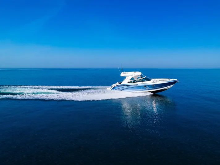 Good Morning Sunshine Yacht Photos Pics 2019 Formula 330 Crossover Bowrider cruising on open blue water.