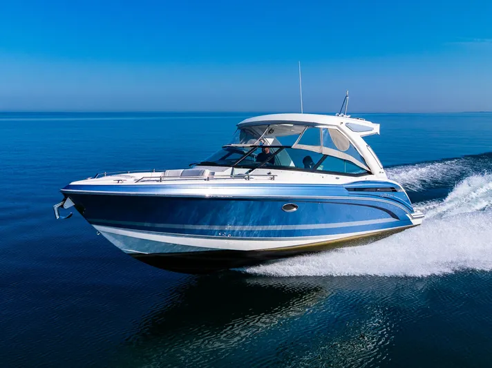 Good Morning Sunshine Yacht Photos Pics 2019 Formula 330 Crossover Bowrider cruising on calm blue waters.