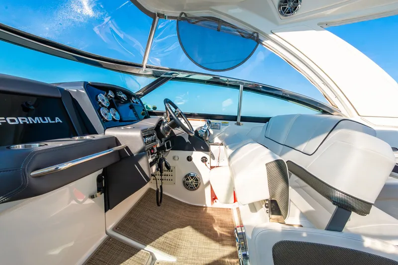 Good Morning Sunshine Yacht Photos Pics 2019 Formula 330 Crossover Bowrider interior with sleek dashboard and luxurious seating.