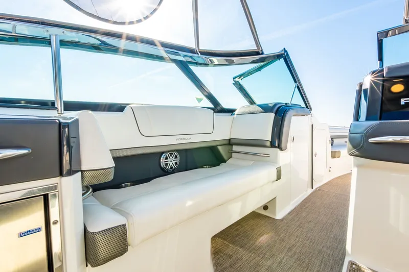 Good Morning Sunshine Yacht Photos Pics 2019 Formula 330 Crossover Bowrider interior with luxurious seating and modern design.