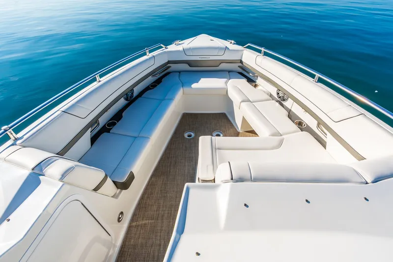 Good Morning Sunshine Yacht Photos Pics 2019 Formula 330 Crossover Bowrider with spacious seating on calm blue water.