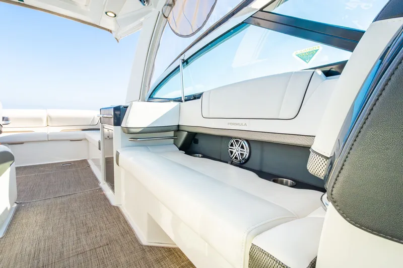 Good Morning Sunshine Yacht Photos Pics 2019 Formula 330 Crossover Bowrider interior with luxurious seating and modern design.