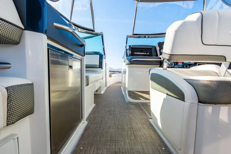Good Morning Sunshine Yacht Photos Pics 2019 Formula 330 Crossover Bowrider interior with luxurious seating and modern amenities.