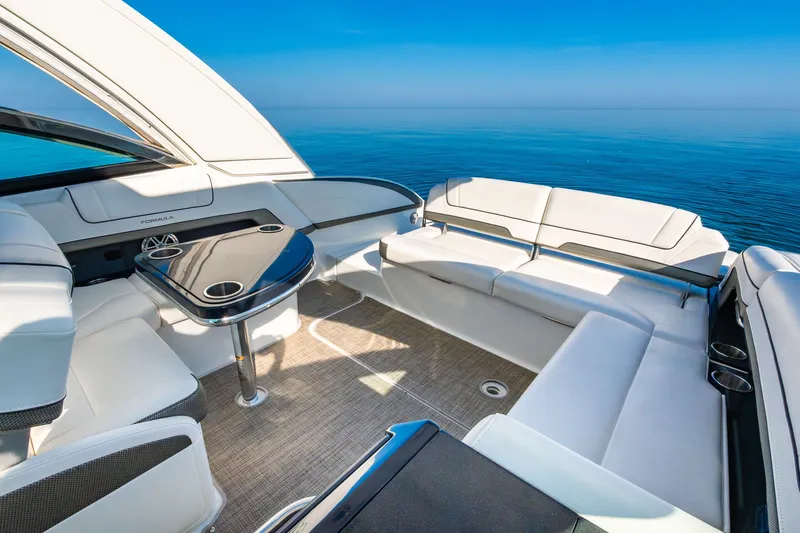 Good Morning Sunshine Yacht Photos Pics 2019 Formula 330 Crossover Bowrider interior with luxurious seating and ocean view.