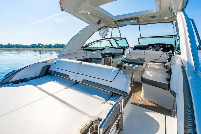 Good Morning Sunshine Yacht Photos Pics 2019 Formula 330 Crossover Bowrider interior with luxurious seating and modern design on a sunny day.