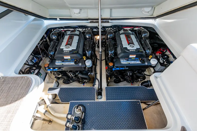 Good Morning Sunshine Yacht Photos Pics Engine compartment of 2019 Formula 330 Crossover Bowrider with twin 350 horsepower engines.