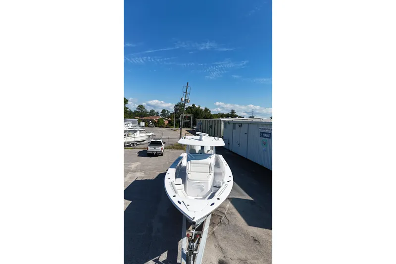  Yacht Photos Pics 2023 Jupiter 40 boat parked outdoors under clear blue sky.