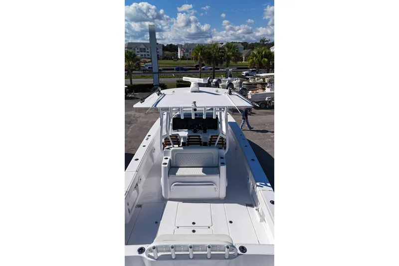  Yacht Photos Pics 2023 Jupiter 40 boat with sleek design, spacious deck, and modern seating under a clear blue sky.