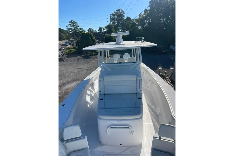  Yacht Photos Pics 2023 Jupiter 40 boat with sleek design and spacious seating area.