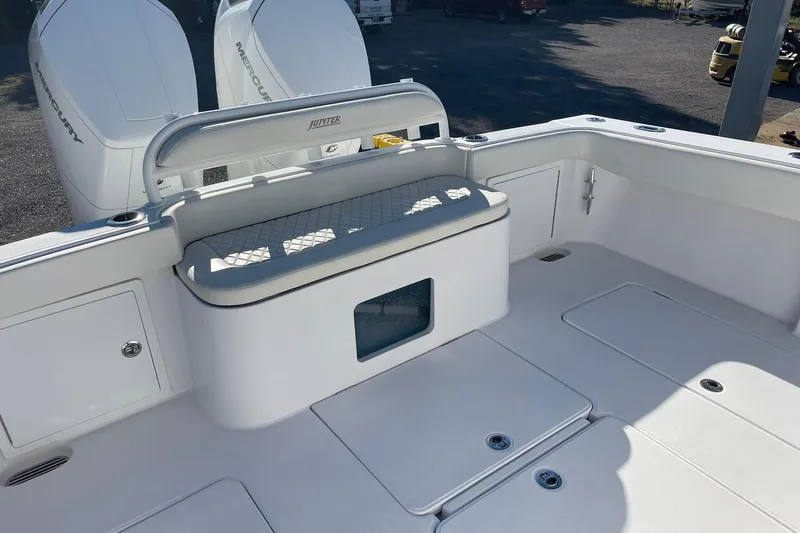  Yacht Photos Pics 2023 Jupiter 40 boat deck with seating and Mercury engines in sunlight.