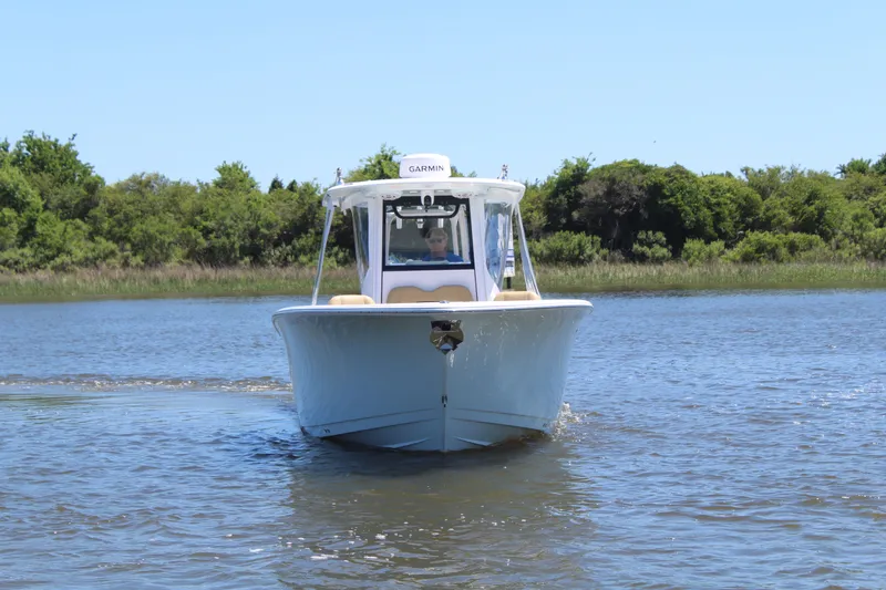  Yacht Photos Pics 2024 Sportsman Open 282 Center Console on calm water.