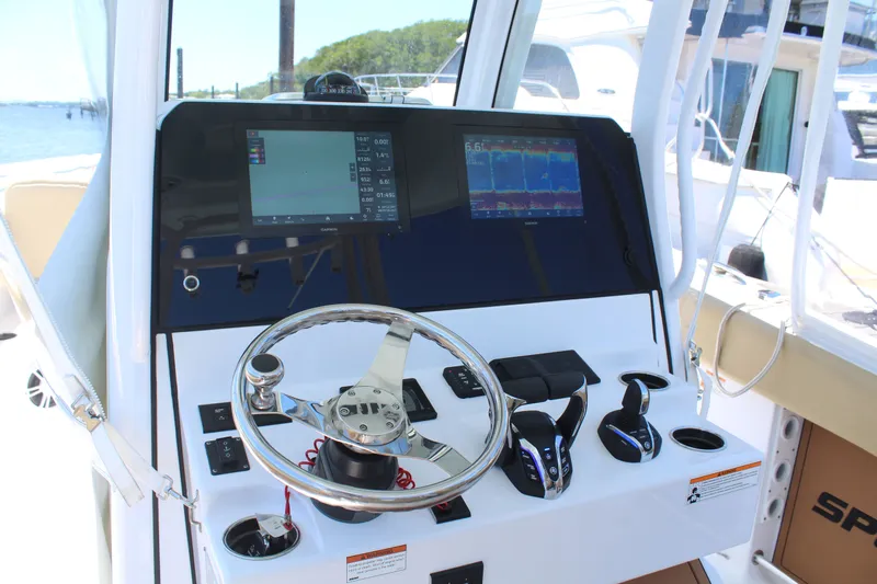 Yacht Photos Pics 2024 Sportsman Open 282 console with modern electronics.