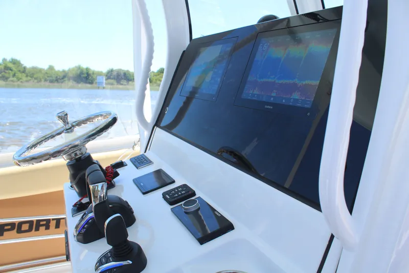  Yacht Photos Pics 2024 Sportsman Open 282 Center Console helm with modern displays.