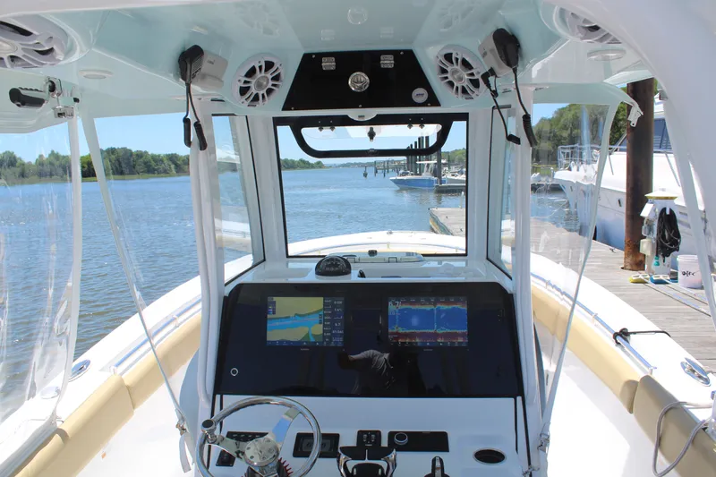  Yacht Photos Pics 2024 Sportsman Open 282 Center Console at dock with modern electronics.