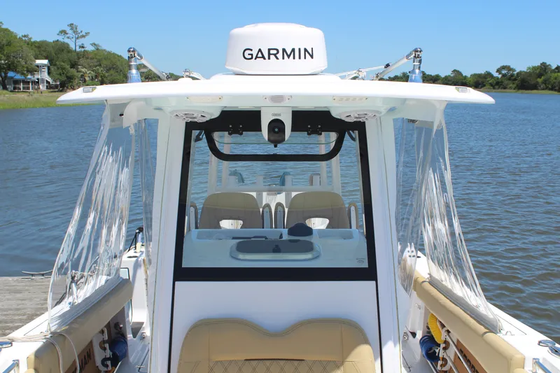  Yacht Photos Pics 2024 Sportsman Open 282 Center Console on calm water.