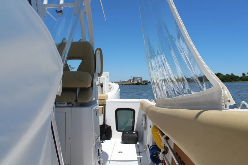  Yacht Photos Pics 2024 Sportsman Open 282 Center Console on calm waters.