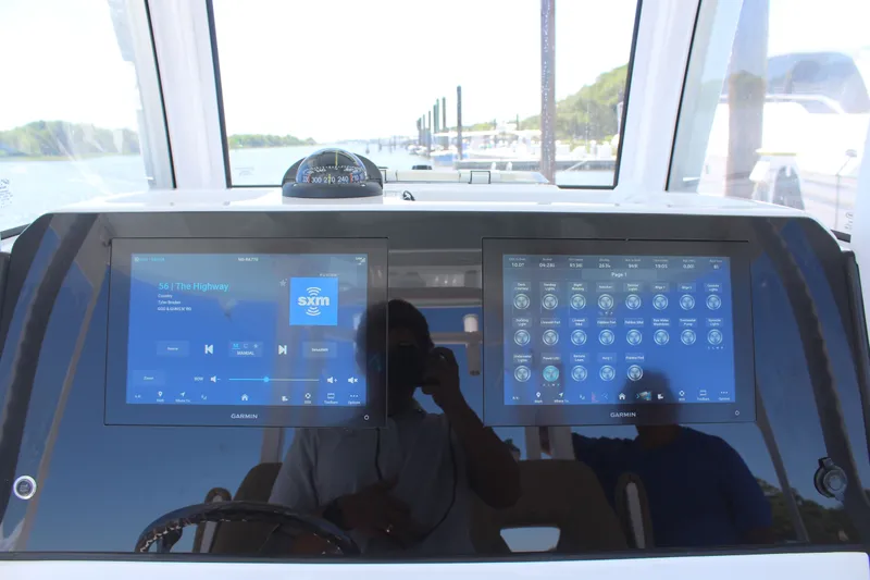  Yacht Photos Pics 2024 Sportsman Open 282 dashboard with Garmin displays.