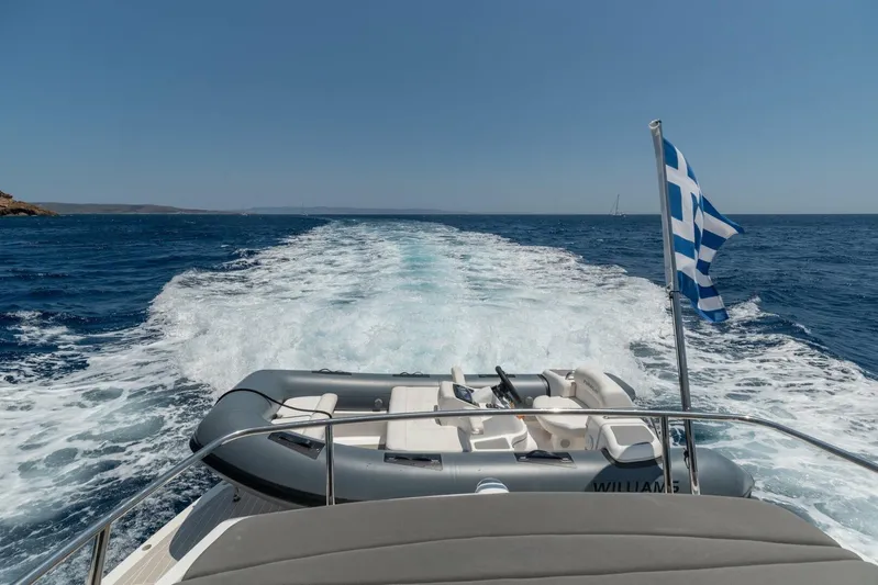 M/y Seaduced Yacht Photos Pics Sunseeker Predator 52 yacht cruising with Greek flag, 2009 model.