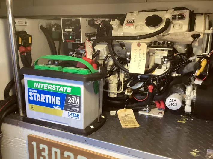 Steal Yacht Photos Pics Engine compartment of a 2020 Formula 380 Super Sport Crossover with marine battery.