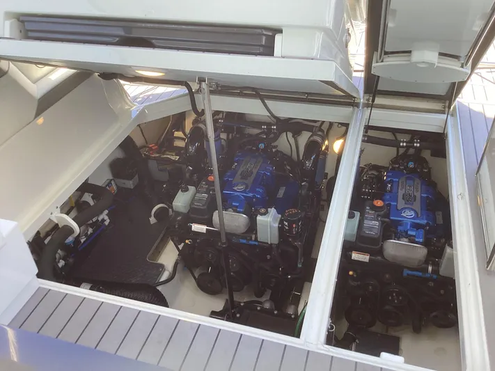 Steal Yacht Photos Pics Engine compartment of 2020 Formula 380 Super Sport Crossover with dual engines visible.