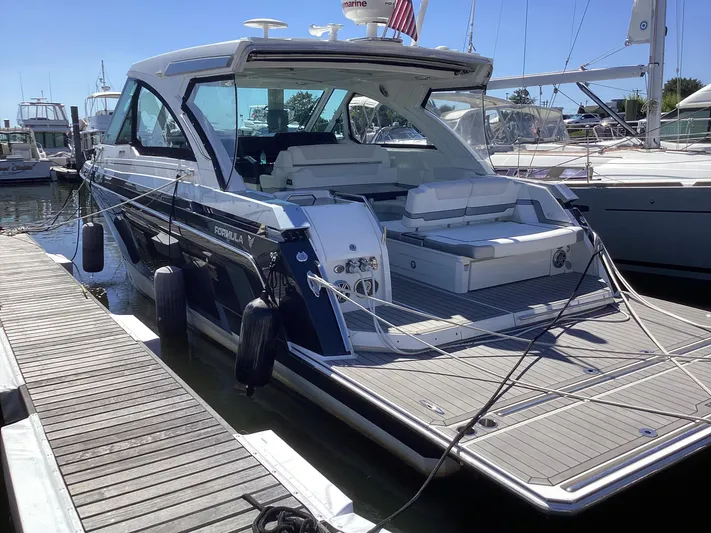 Steal Yacht Photos Pics 2020 Formula 380 Super Sport Crossover yacht docked at marina, showcasing sleek design and luxury features.